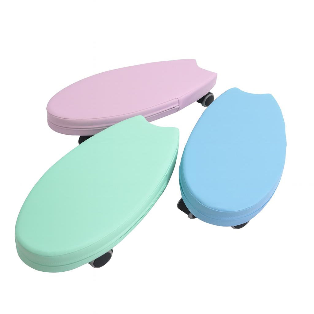 Three colorful surfboard-shaped soft ride on toys with wheels on a white background