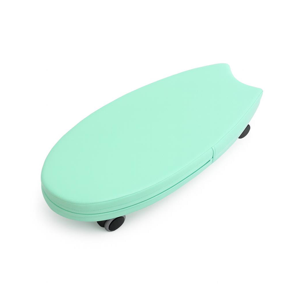 Light green soft ride on toy with wheels on a white background